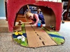 Fun with a box on a rainy inside day.