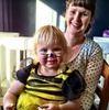 Olive becomes a bumble cat thanks to Catherine at Alex's birthday party.