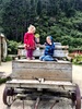 On the tractor with Ben and Alex