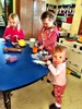 Iris leaving the baby pit to hang with the big girls, Amy, Olive & Mia. Gosh she looks too small to be standing! Her first official playdoh taste -yuck! Isn't it funny how everyone knows what it tastes like? Iris is starting to explore Playcentre.