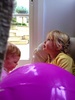 Iriee has discovered olive's chair cave. Olive is fantastic at letting Iriee in on the fun.
