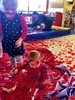With s bag full of recycled parade poppies, it raining and the playground still a construction site, the kids and adults had ball!