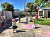 The annual friends Christmas party hosted this year by Nige and Lana. A fantastic day of sun, pizza, rotisserie beef ribs (amazing), water balloons, pink chalk and a barefoot Santa (Josh) that Olive was still pretty nervous about.