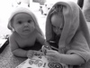 So far Olive has been really understanding of Iris and her new found movement and curiosity. She either moves further away or let's Iris play with the toy. Bath time is getting more and more fun with two!