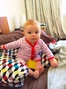 Iriee is sitting, well she has been able to do it for a little while but still with a bit of cushion help! She also has her first tooth!!!