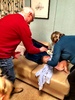 It takes two grandparents to change this munchkin!