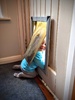Got to keep an eye on the dog flap these days or else cheeky is halfway across the deck before you know it! She also loves sitting in things like the trolley or Olives doll beds.