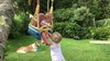 Backyard Swinging! Not the best spot for the swing, but it works for now.