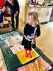 Olive was very unsure of the sensory pathway we did at Playcentre but after one go and enjoying the slime (which was 'like ice skating') she was the last off it. She held onto Sarah's hand and they helped each other through the trays. Don't try this at home! Olive's feet are still red!