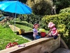 4.30pm knock off drink on the deck while the girls made mud pie, ate some, chased Lyon, picked lots of mummy's flowers and finished off with a spot of sweeping.
