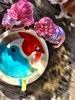 Colour mixing fun. This was a great way of slowly seeing the red mix into the blue and change colour, olive was quite excited about it. Iris just enjoyed copying olive and drinking it.