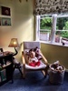 Iris's favorite spot. Sitting on the chair in her room and turning on and off the lamp.