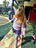 Iris and olive enjoy paint between their toes. Iris was a bit unsure of the feeling and they both managed bum prints too!