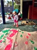 Iris and olive enjoy paint between their toes. Iris was a bit unsure of the feeling and they both managed bum prints too!