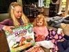 Opening presents from each other on Christmas morning.