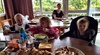 The babies at lunch and at play. Iris liked to push them round a bit.