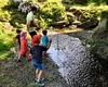 Rory shows the kids how to make a boat that sails down the river!