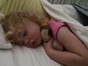 We got lucky one morning when iris woke early but went back to sleep in our bed! Princess is her favorite toy called Angela ballerina.