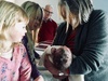 Nan and Grandad bring the girls to meet bubs.