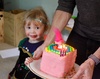 Irisâ€™ morning tea birthday party. A couple of friends, some yummy food, and few games and a sponge cake! Iris felt very special and Juniper slept through the whole thing.
