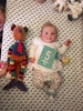 Our big five month old. Managed a roll earlier in the week, hates bath time, starting doing longer morning naps sometimes! Loves watching big sisters playing, generally a happy smilie wee ju ju.