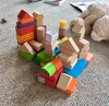 Iris is always busy busy, often leaving a trail of destruction in her wake. This time, however, she created an amazing little castle town from the blocks she nabbed from Junipers room.