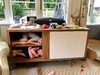 My daughters like to hide in cabinets.