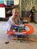Juni gets her birthday present early (donâ€™t tell daddy- there are rules) and it is perfect for her practicing standing! We just get stuck standing so usually a sister helps her down to sitting again.