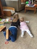 The joy of three, watching this relationship grow, with over 5 years between them, Olive has taken on a motherly, carer role. Reading Juni books.
