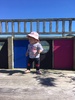 Juni stoked to be sitting on a big chair at Kpc. Exploring and climbing everything now!