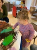Kpc: pine cone glitter decorations, tyre swing and â€˜hangiâ€™ baked Kumara