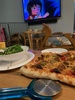 Lockdown day twenty four: Tom places dog poo bucket and tidied under carport with iris. Pizza and family movie night.