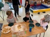 Making pizza at kpc.