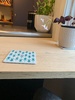 Varnish goes on and bracelets. Now which bar stools?