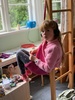 Iris continues to love audio book Harry Potter… from her self made swing chair.