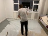 We used old paint (nandads rejected paint) to seal the plywood floor to make it nicer to walk on until carpet time.