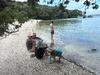 Shelly bay with stingray and a paddle.