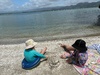 Shelly bay with stingray and a paddle.