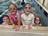 Juni’s early birthday party, at the pool with takeaway snack boxes.