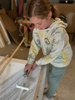So the panel painting begins… thankfully many hands makes light work of it!