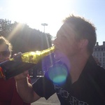 Tom enjoys a swig.