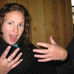 Gini with purple fingers after a day of picking grapes.
