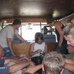 In the back of the van again.