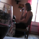 Enjoying a glass of vin.