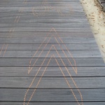 Bike signs engraved into the board walks