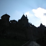 Sun peeking through the cloud over the Medieval Cité