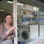 Washer woman with a coffee