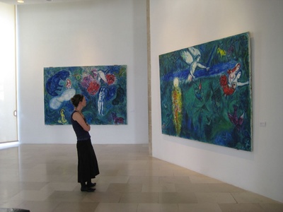 Admiring one of his many masterpieces