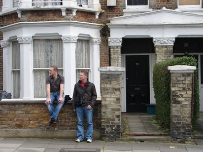 Some shady locals hanging on their stoop