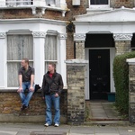 Some shady locals hanging on their stoop